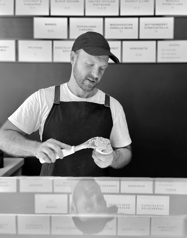 Ryan scooping fresh gelato for a customer